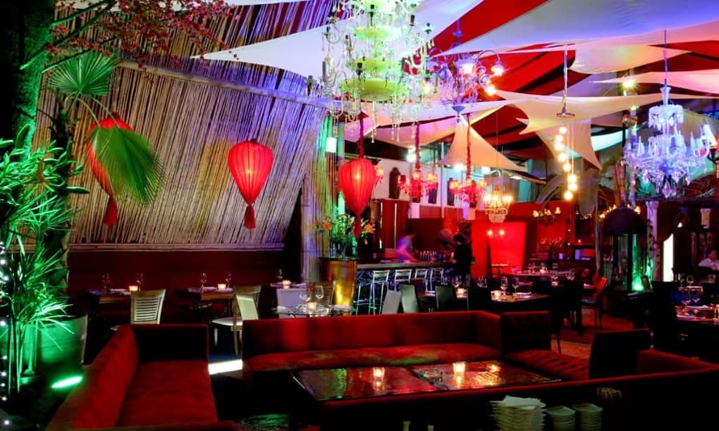 An opulent funhouse with an eclectic interior design that could easily pass for the set of a Wong Kar-wai film.