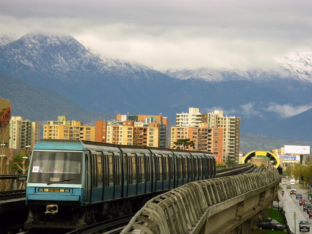 A Santiago Metro train on an elevated section of line 5